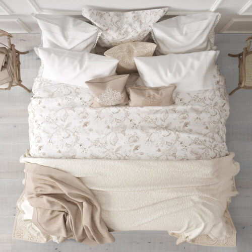 directly overhead view of bedroom with hardwood floor, furnished bed, and two chairs