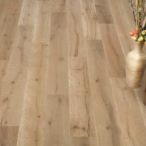 hardwood floor with wicker table and vase with flowers